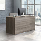 Sauder - 427415 Affirm Desk 60" W x 24" L - Hudson Elm-Melamine top surface is heat, stain, and scratch-resistant.