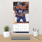 DateWorks 2026 16-Month Wall Calendar - 12" x 12" - Edmonton Oilers - Bilingual-Features monthly pages for January to December 2026, as well as the last 4 months of 2025