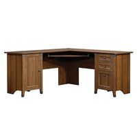 Sauder Carson Forge Corner Computer Desk, Washington Cherry 2 Ctns-The Carson Forge Corner Computer Desk has a slide-out keyboard/mouse shelf with metal runners and safety stops
